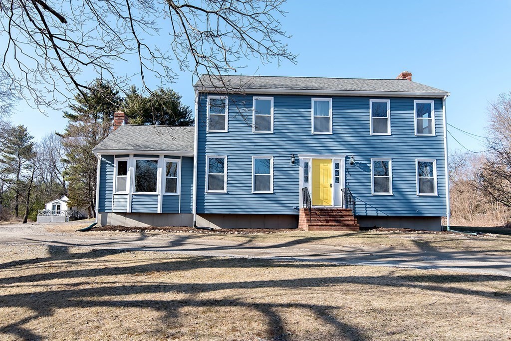 889 Upper Union Street Franklin, MA 02038 - Photo 2 of 42 a front view of a house