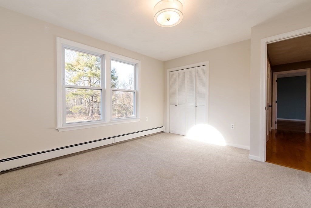 889 Upper Union Street Franklin, MA 02038 - Photo 30 of 42 an empty room with windows