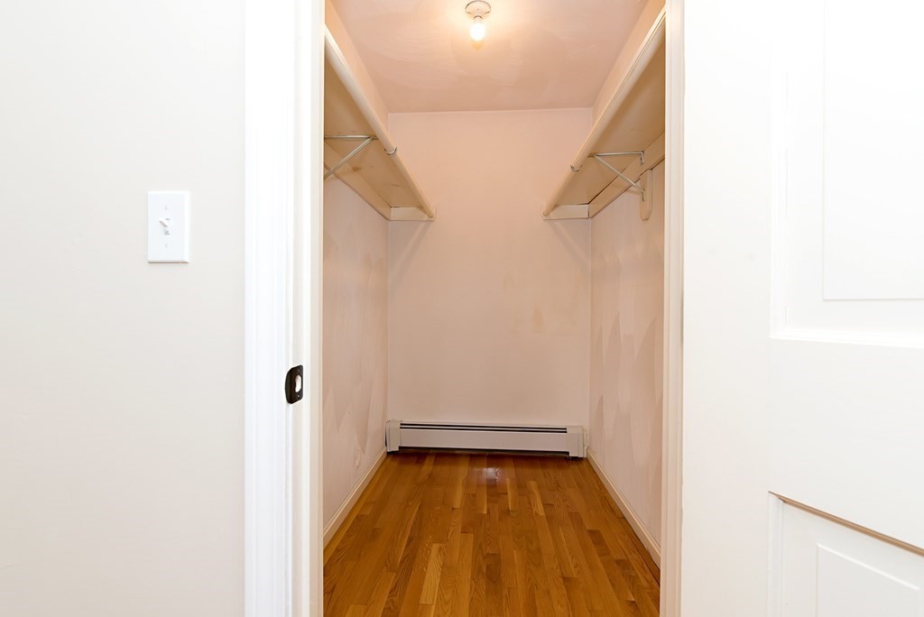 889 Upper Union Street Franklin, MA 02038 - Photo 34 of 42 a view of a room with wooden floor
