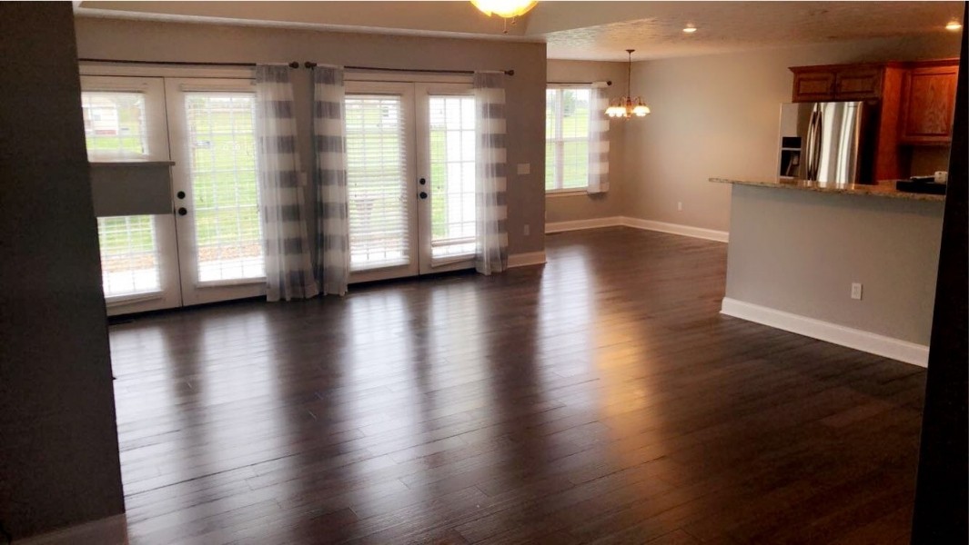 248 Faith-Rae Boulevard Morrison, TN 37357 - Photo 12 of 23 a view of an empty room with wooden floor and a window