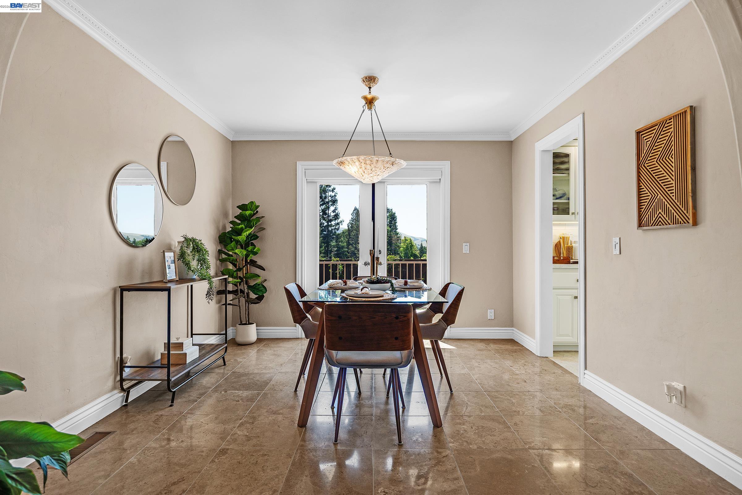 17 Suva Court San Ramon, CA 94582 - Photo 7 of 47 a dining room with chandelier fan and wooden floor