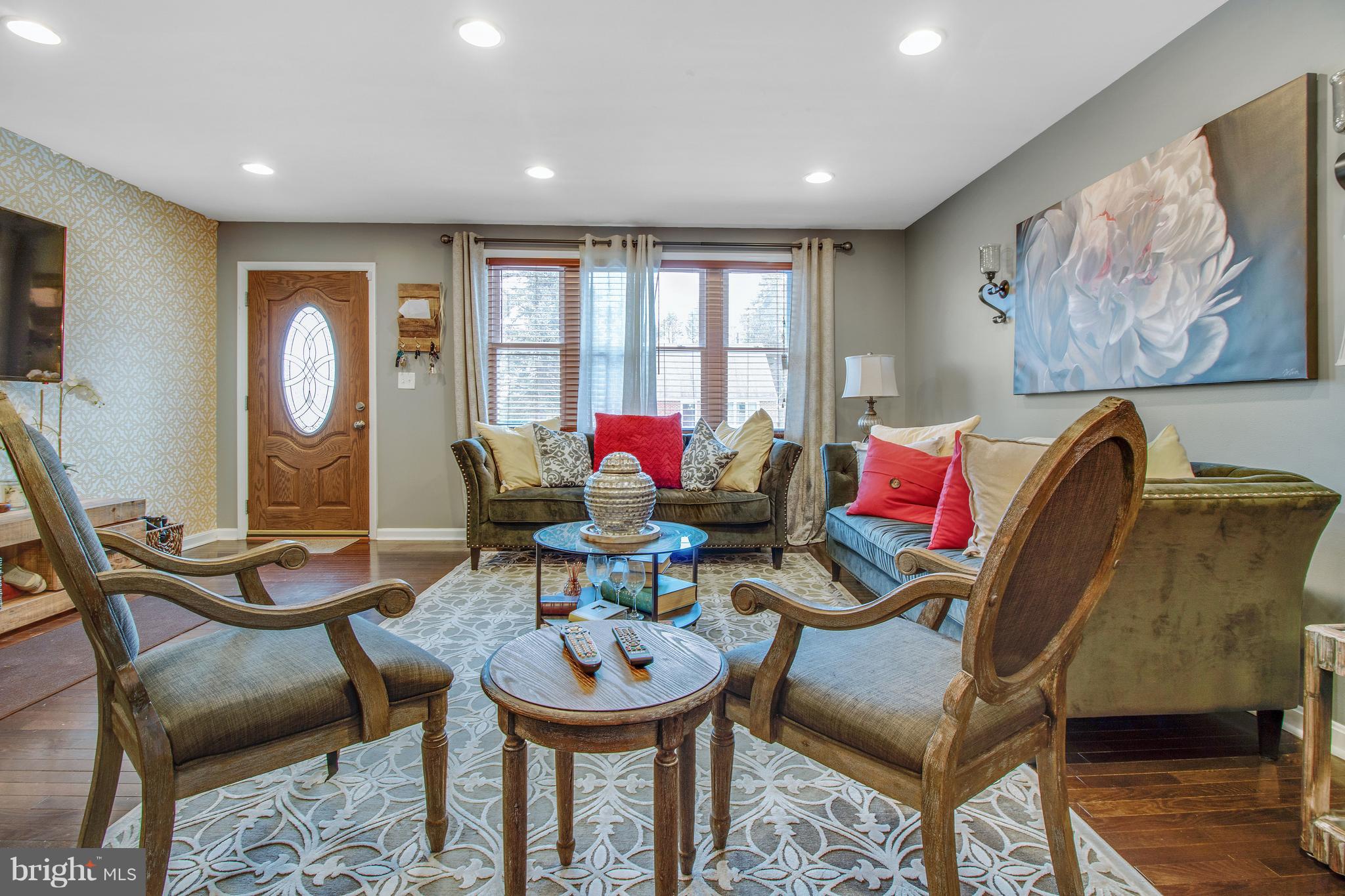 3708 Collier Road Randallstown, MD 21133 - Photo 4 of 25 a view of a dining room with furniture and wooden floor