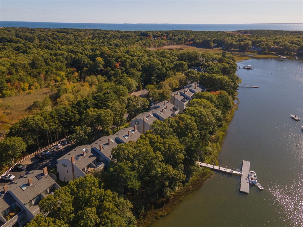 381 Great Oak Road, Unit 9 Mashpee, MA 02649 - Photo 39 of 42 an aerial view of residential house with outdoor space