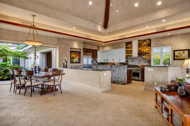 a lobby with furniture and window