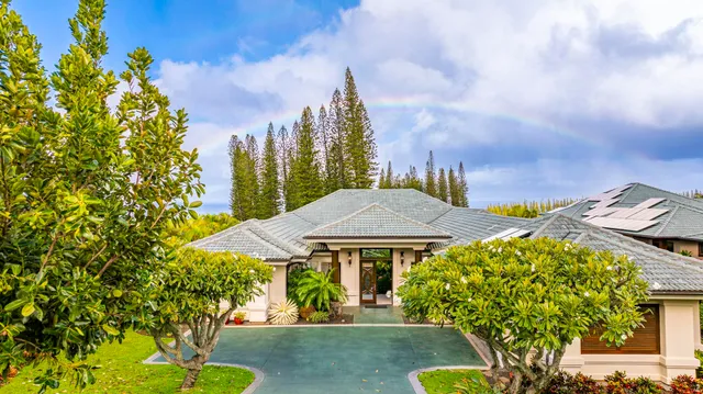 a view of an entryway with furniture and windows