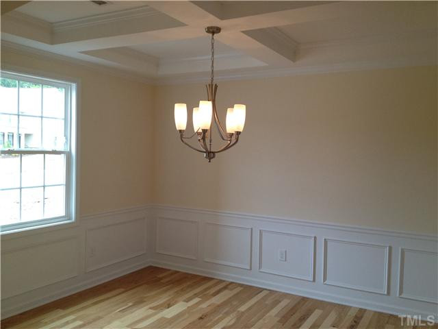 9 Hidden Ridge Court Durham, NC 27707 - Photo 3 of 25 Beautiful hardwoods and coffered ceiling in the formal dining. Great place to entertain!