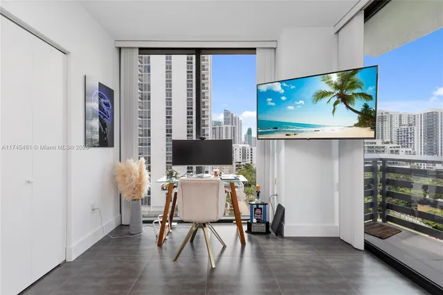 a bedroom with a large window