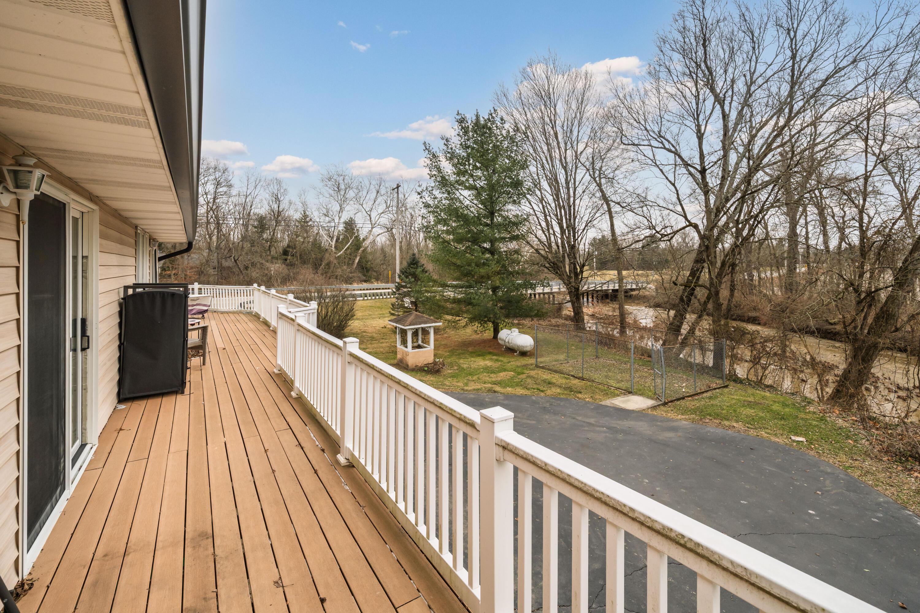 7173 Refugee Road Southwest Pataskala, OH 43062 - Photo 39 of 53 Deck wraps around