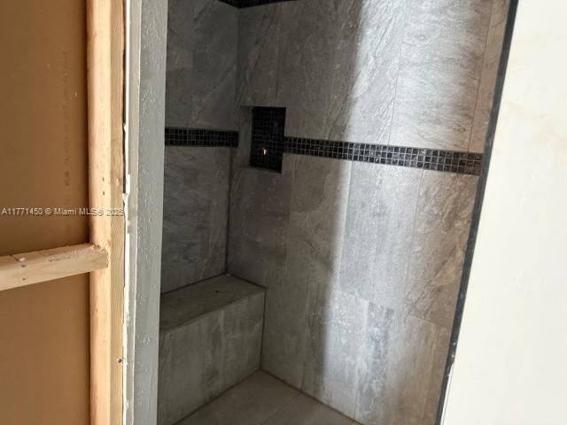 162 Tropical Shore Way Fort Myers Beach, FL 33931 - Photo 19 of 32 a bathroom with a shower