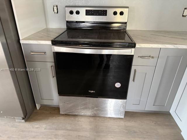 162 Tropical Shore Way Fort Myers Beach, FL 33931 - Photo 20 of 32 a stove top oven sitting inside of a kitchen