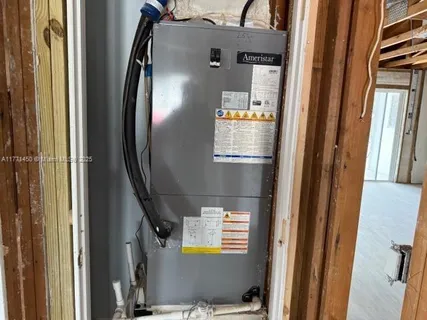 a utility room with a bench