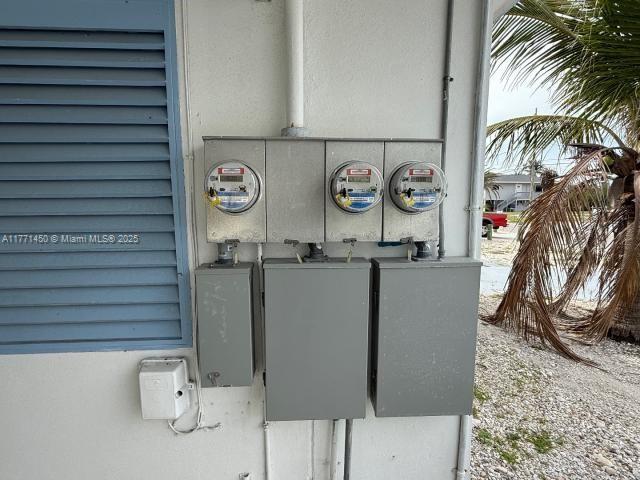162 Tropical Shore Way Fort Myers Beach, FL 33931 - Photo 27 of 32 a utility room with a bench