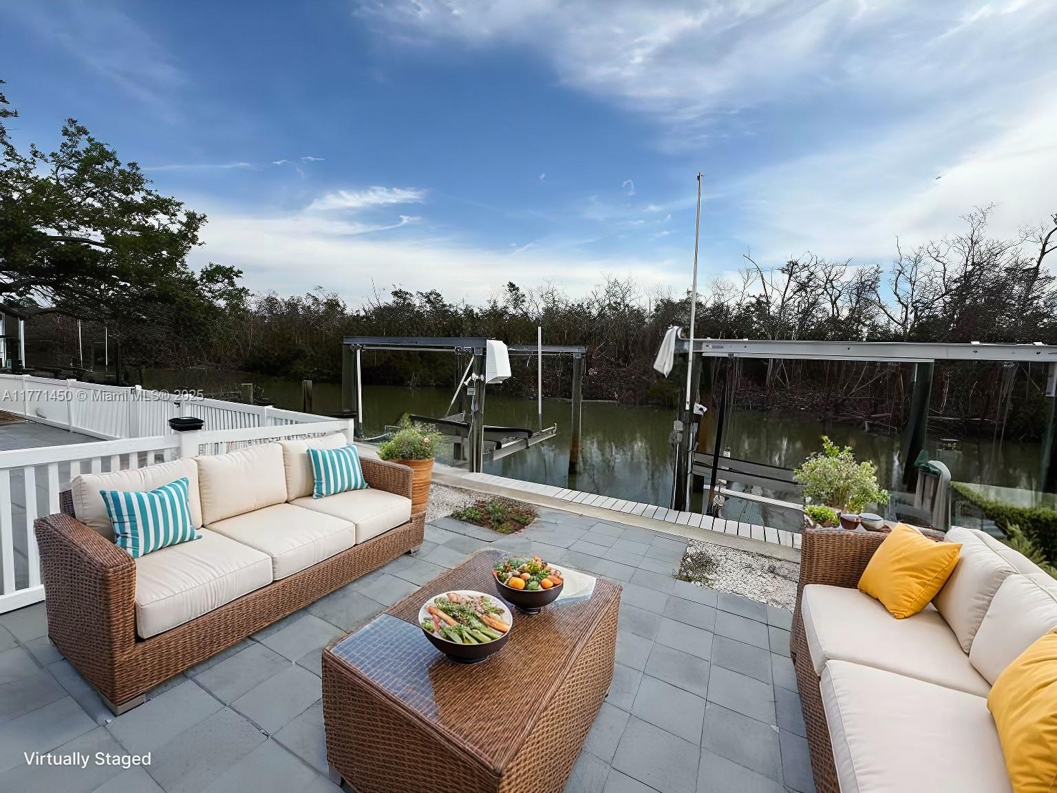 162 Tropical Shore Way Fort Myers Beach, FL 33931 - Photo 30 of 32 a outdoor living space with furniture and garden view