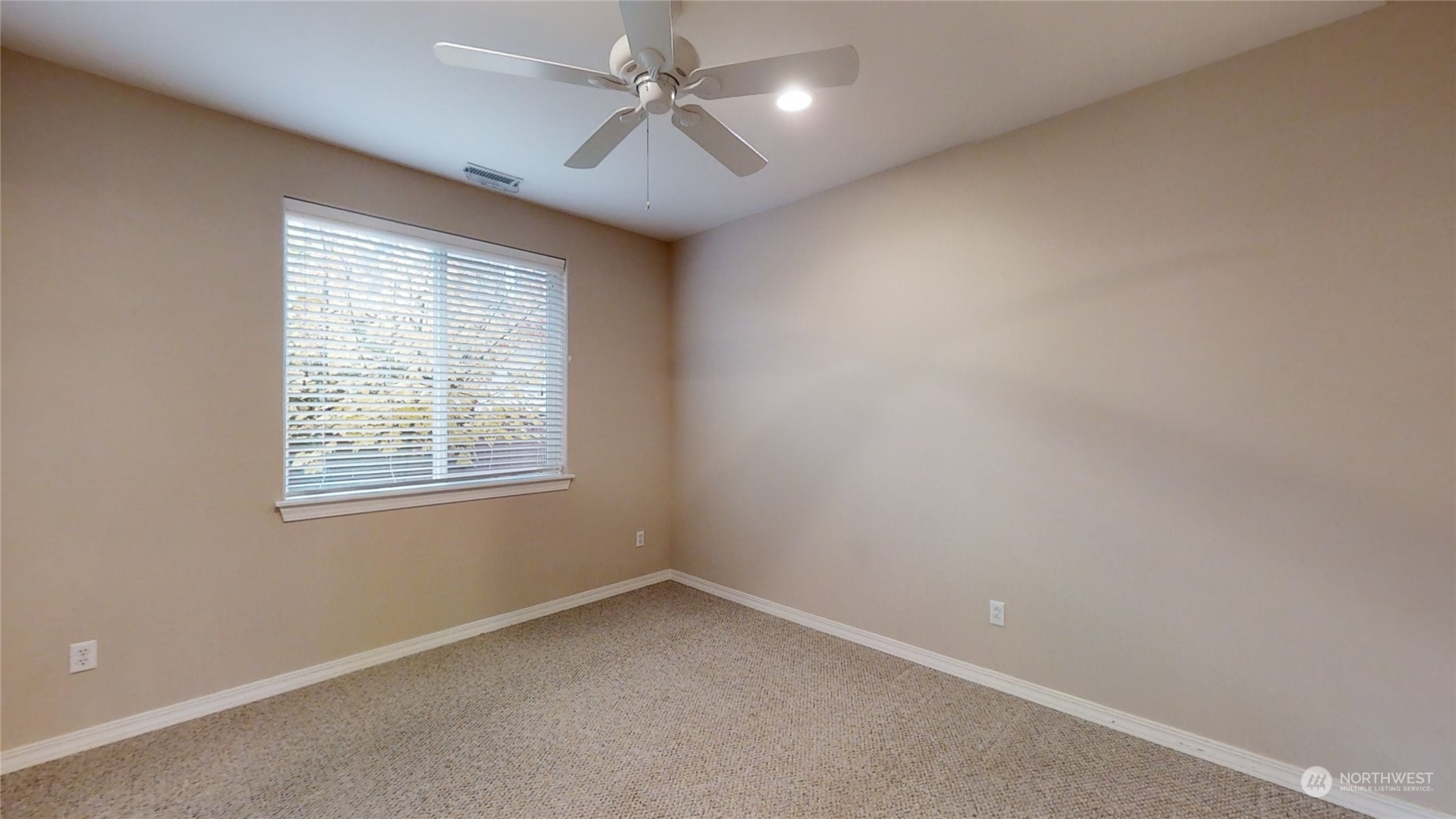 5018 Cypress Loop Northeast Lacey, WA 98516 - Photo 14 of 30 a view of an empty room with a window