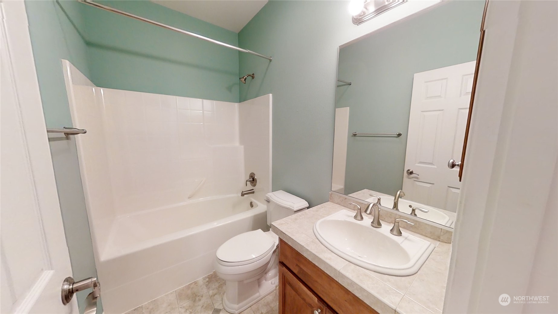 5018 Cypress Loop Northeast Lacey, WA 98516 - Photo 15 of 30 a bathroom with a sink toilet and shower