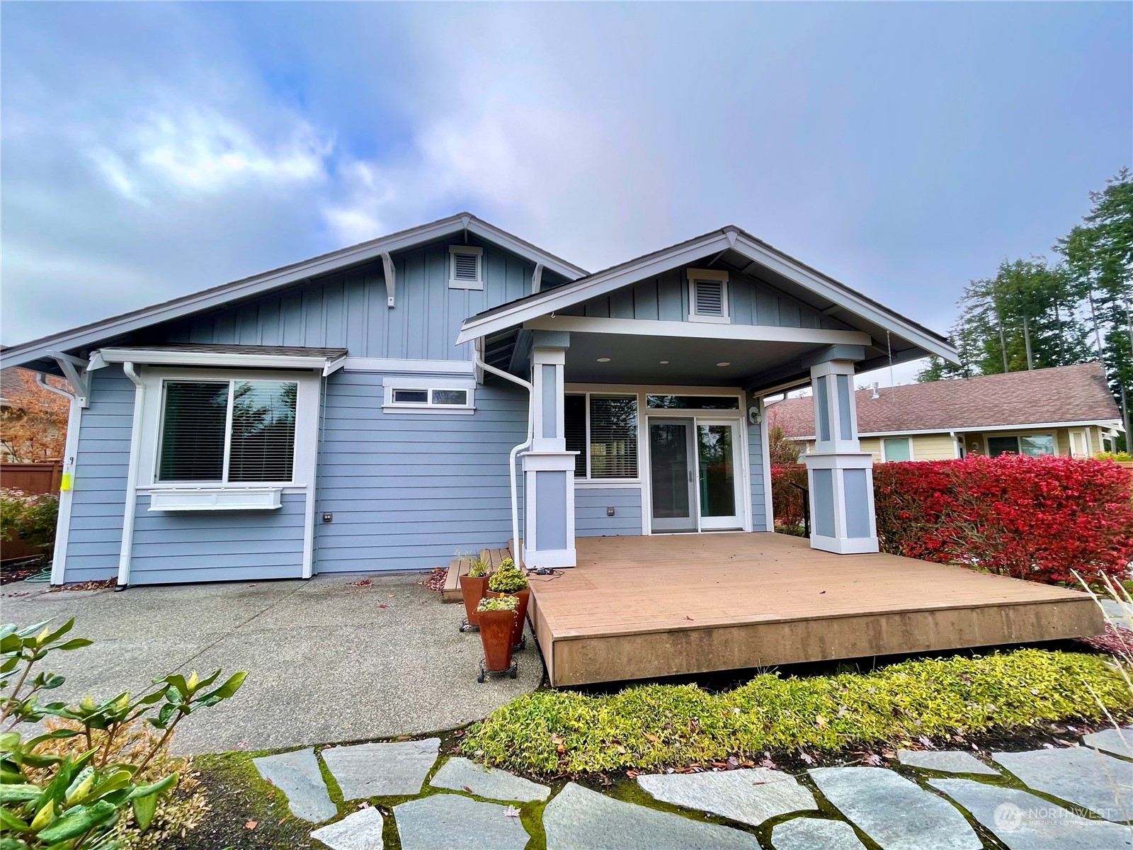 5018 Cypress Loop Northeast Lacey, WA 98516 - Photo 16 of 30 a front view of a house with garden