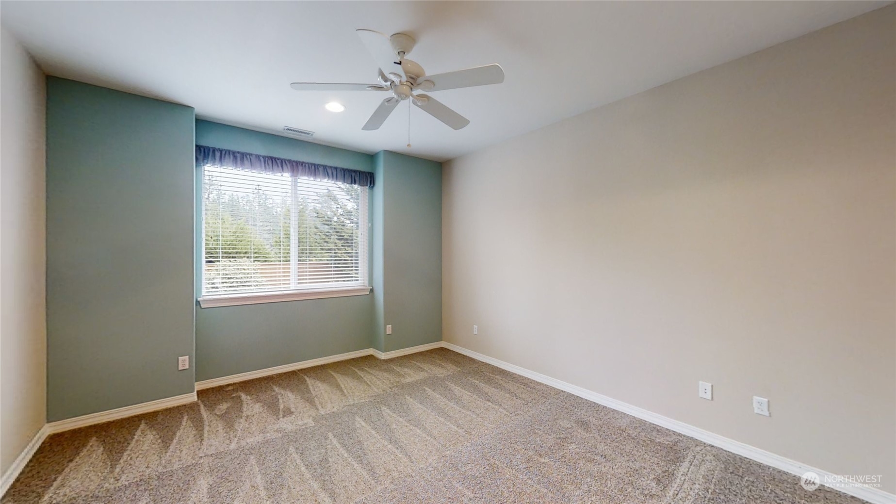 5018 Cypress Loop Northeast Lacey, WA 98516 - Photo 10 of 30 wooden floor in an empty room with a window