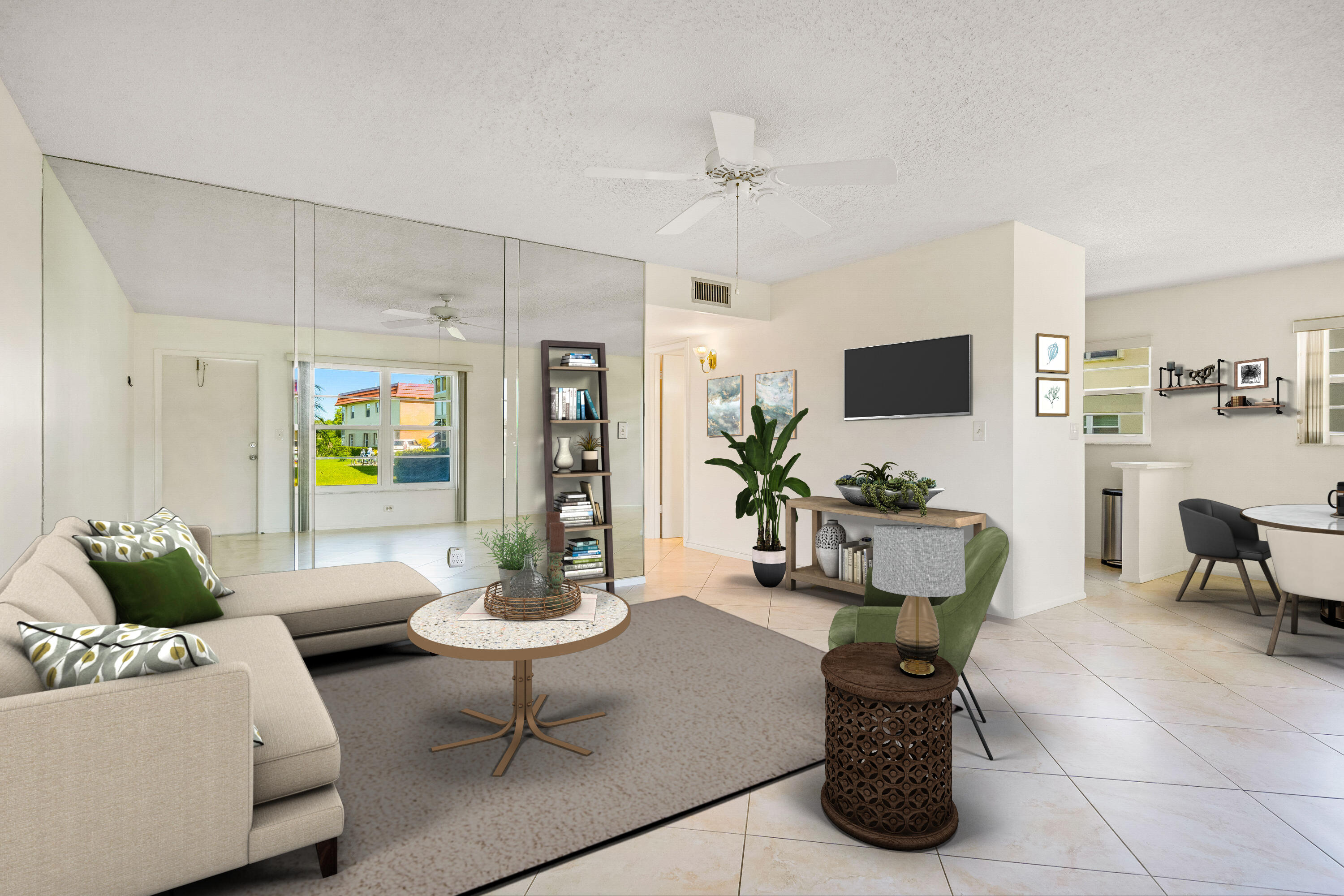 a living room with furniture and a potted plant