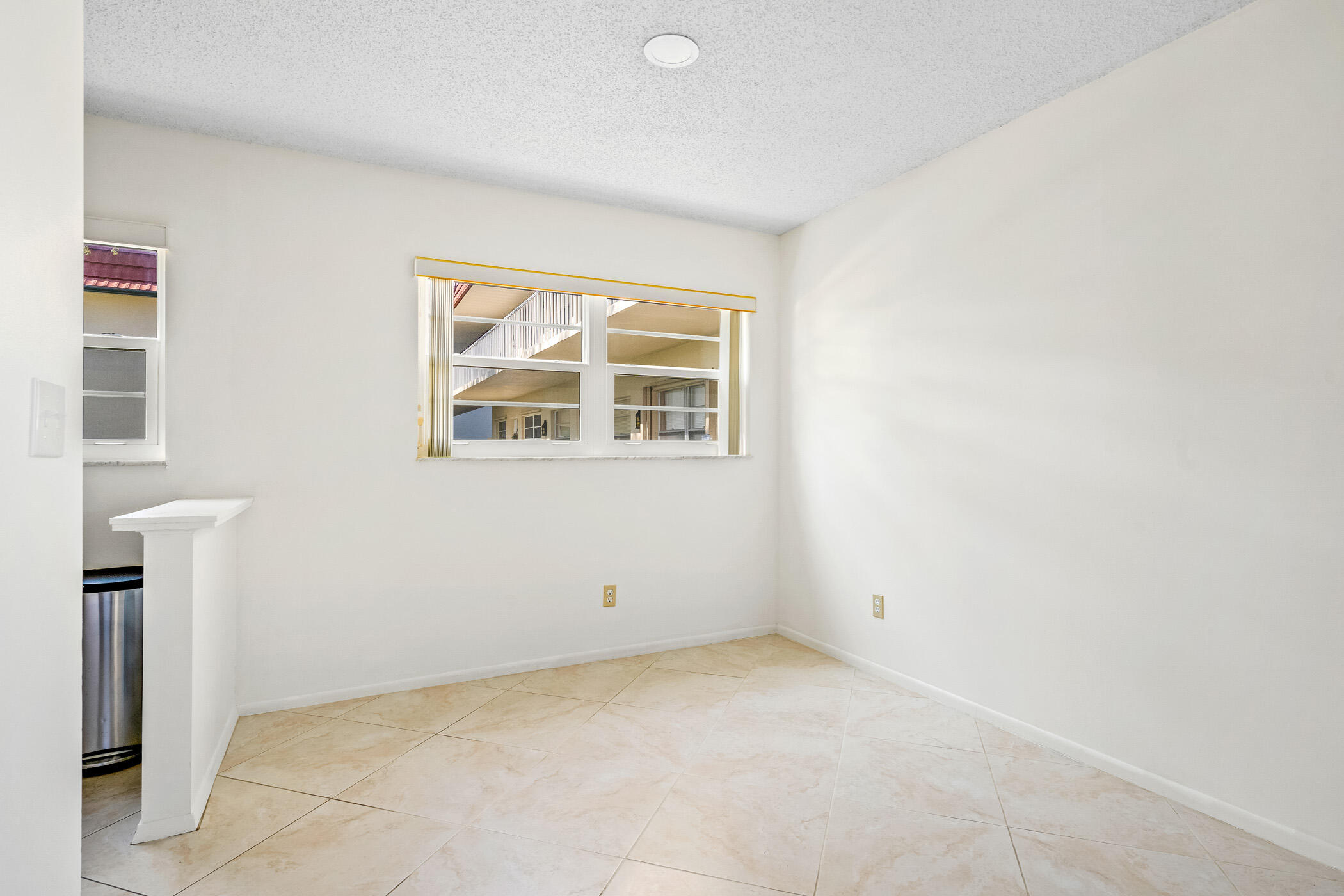 Undisclosed Address Vero Beach, FL 32962 - Photo 11 of 34 an empty room with a window