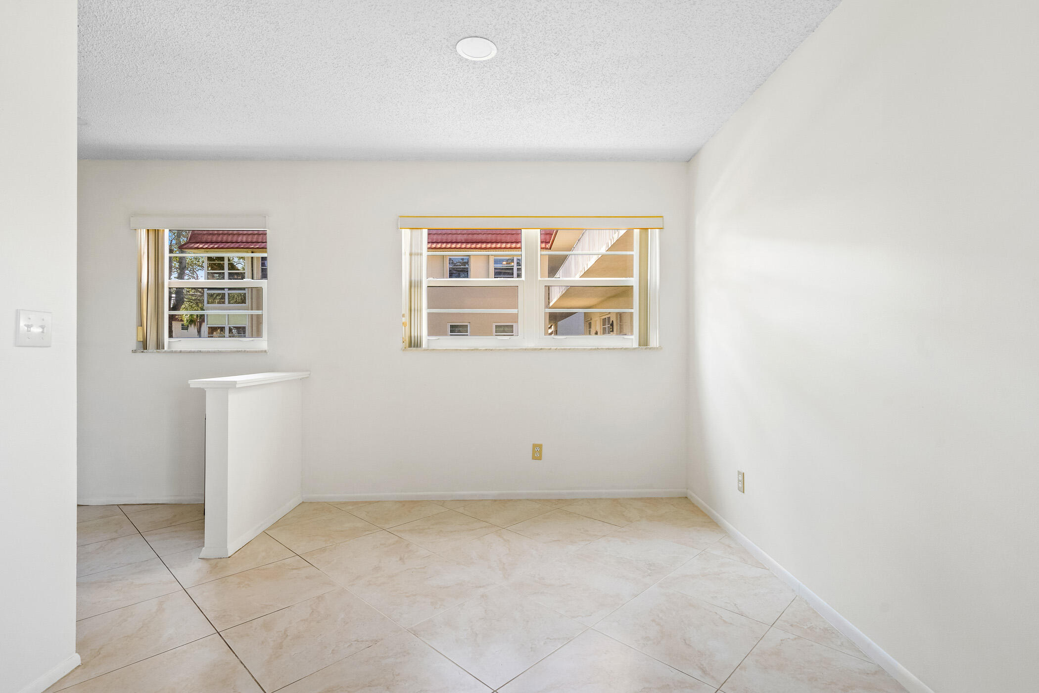 Undisclosed Address Vero Beach, FL 32962 - Photo 12 of 34 an empty room with windows