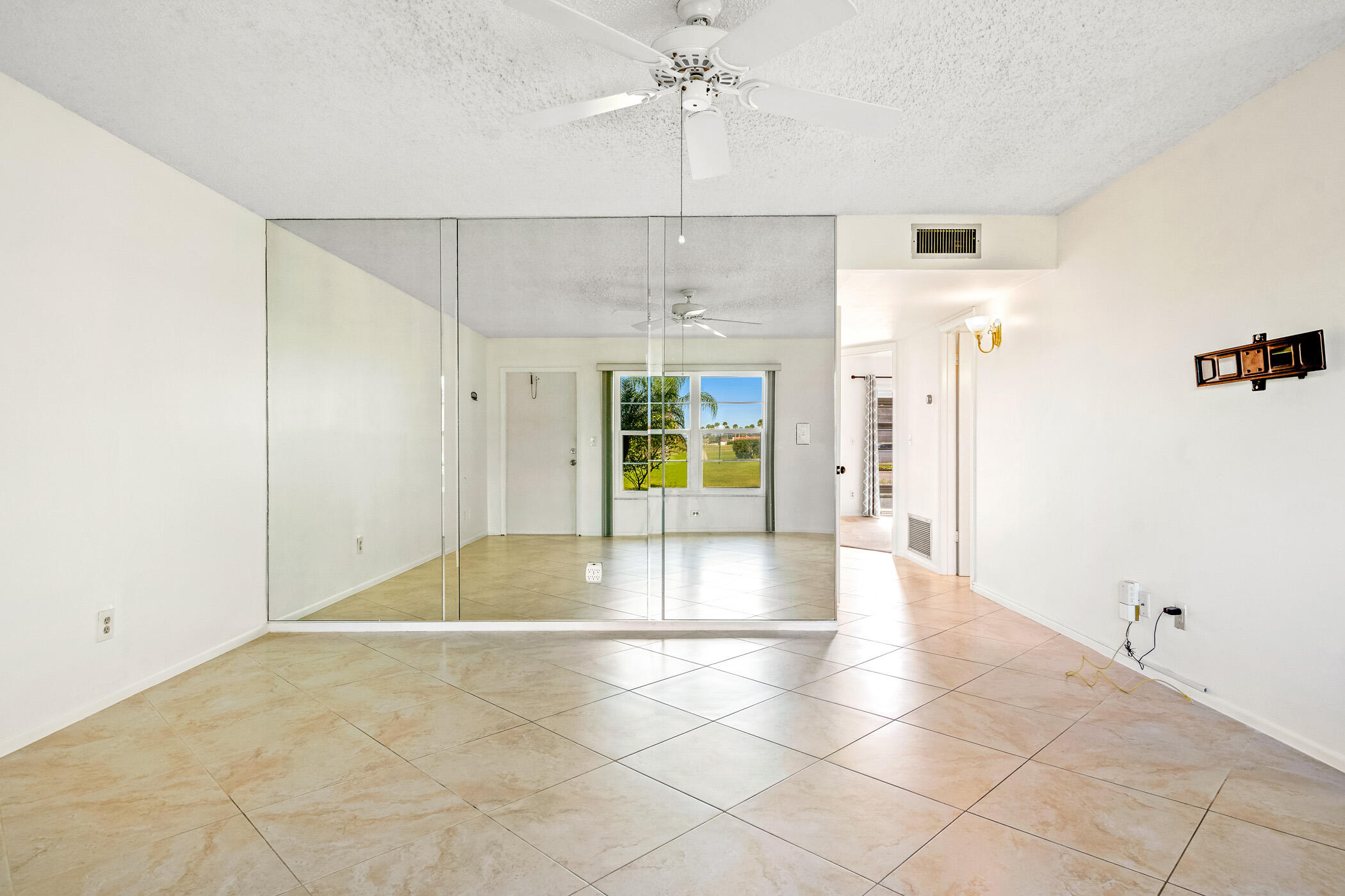 Undisclosed Address Vero Beach, FL 32962 - Photo 13 of 34 a view of an empty room with a window