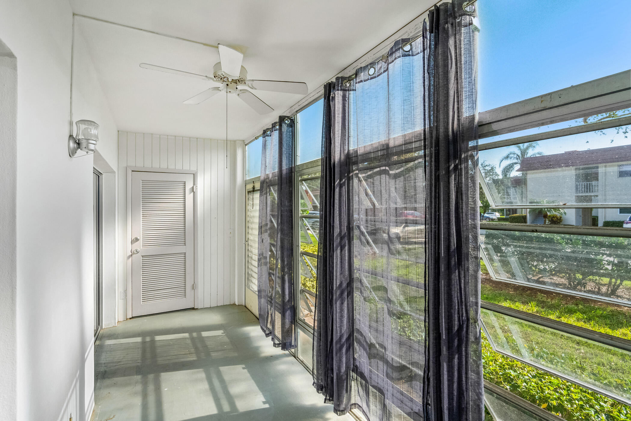Undisclosed Address Vero Beach, FL 32962 - Photo 14 of 34 a view of a glass door and window