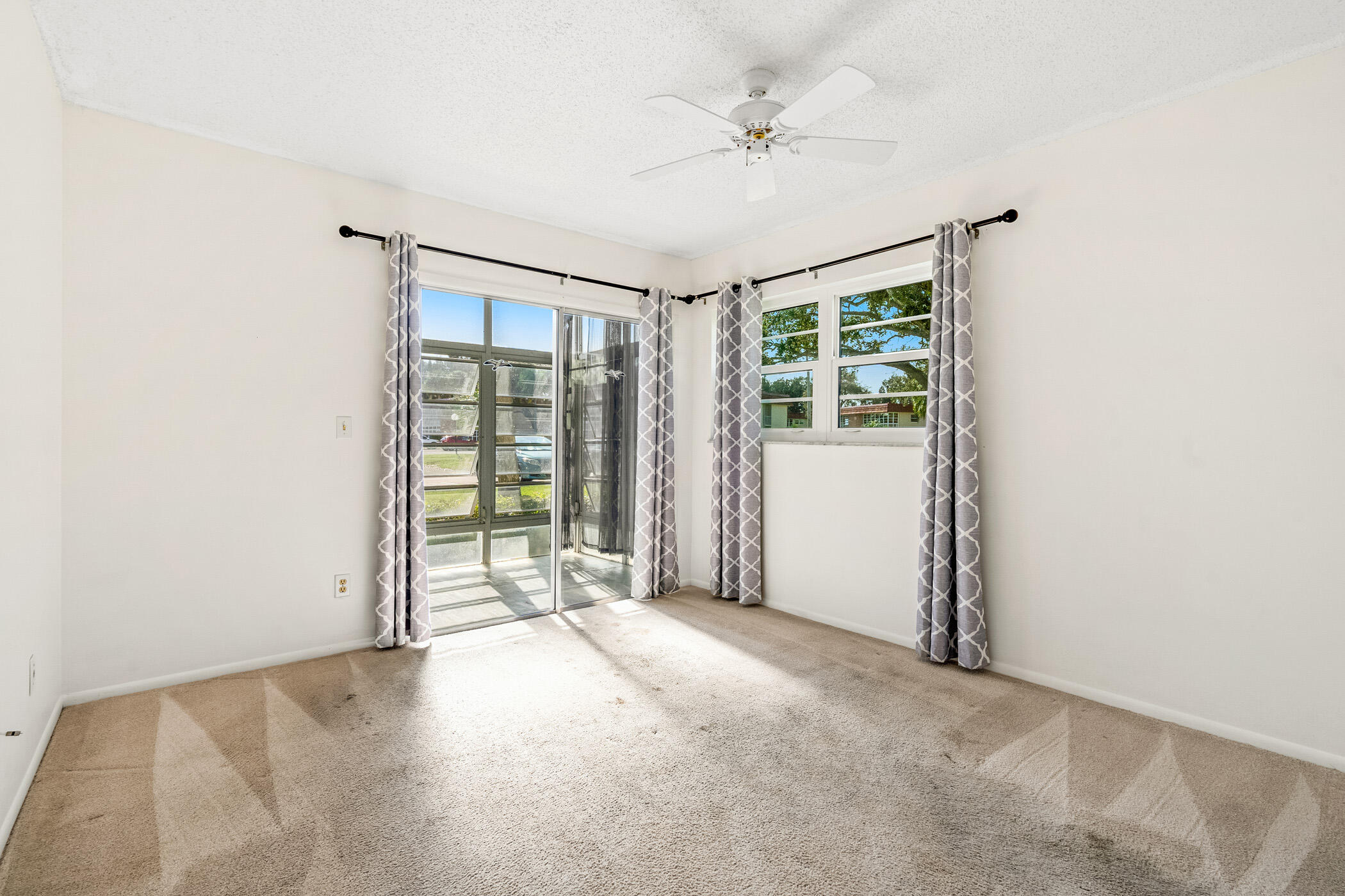 Undisclosed Address Vero Beach, FL 32962 - Photo 16 of 34 a view of an empty room with a window
