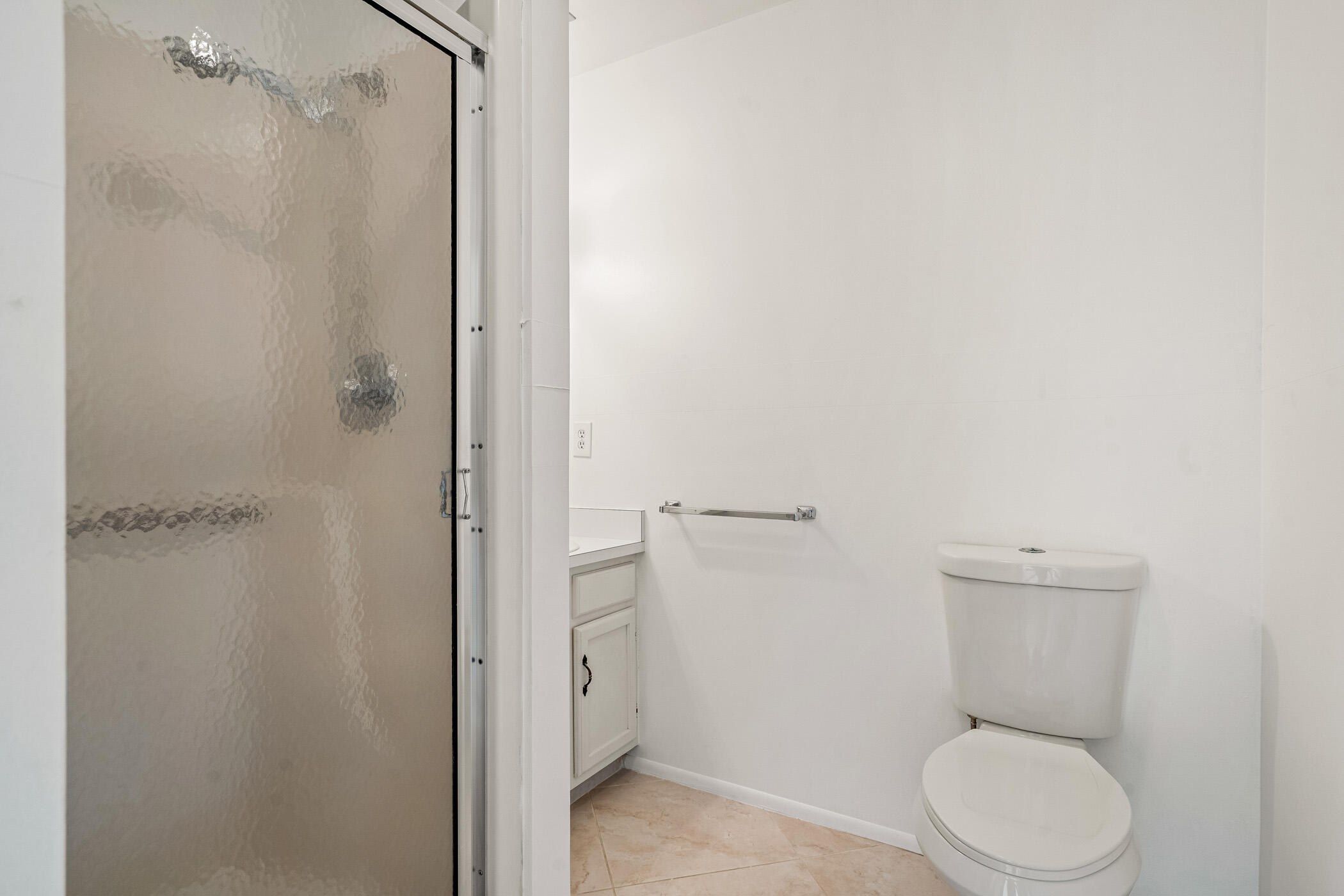 Undisclosed Address Vero Beach, FL 32962 - Photo 22 of 34 a bathroom with a toilet and a shower