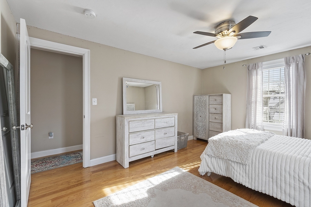 103 Reed Street Rockland, MA 02370 - Photo 22 of 33 a bedroom with a bed and a dresser