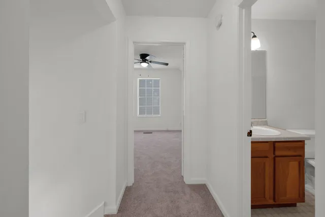 a view of a hallway with closet