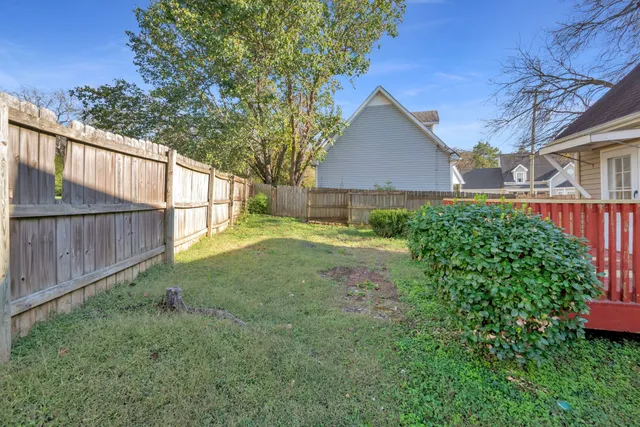 a view of backyard with green space
