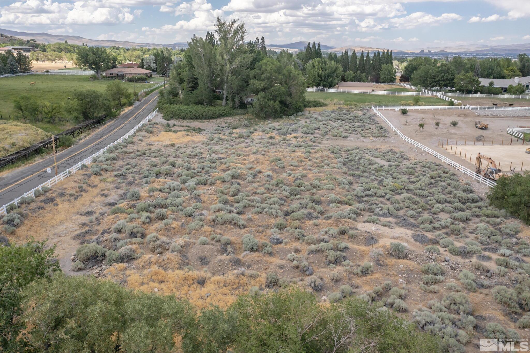 0 Del Monte Lane, Unit 8 Reno, NV 89511 - Photo 8 of 13 a view of a road with a yard