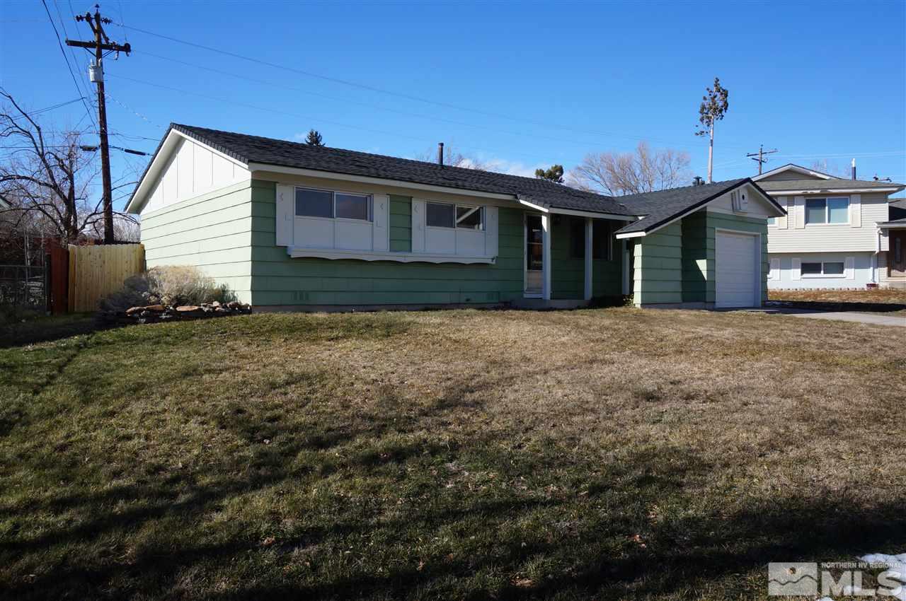 3465 Rauscher Drive Reno, NV 89503 - Photo 1 of 1 a front view of a house with a yard
