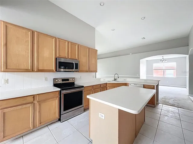a bathroom with a sink a vanity and a mirror