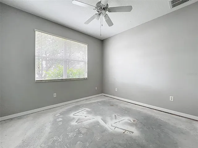 a bathroom with a tub sink shower and mirror