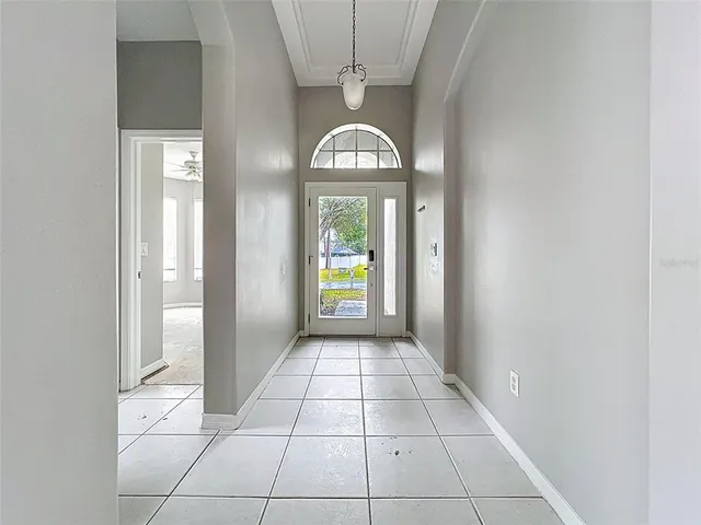 a kitchen with stainless steel appliances a sink stove and cabinets
