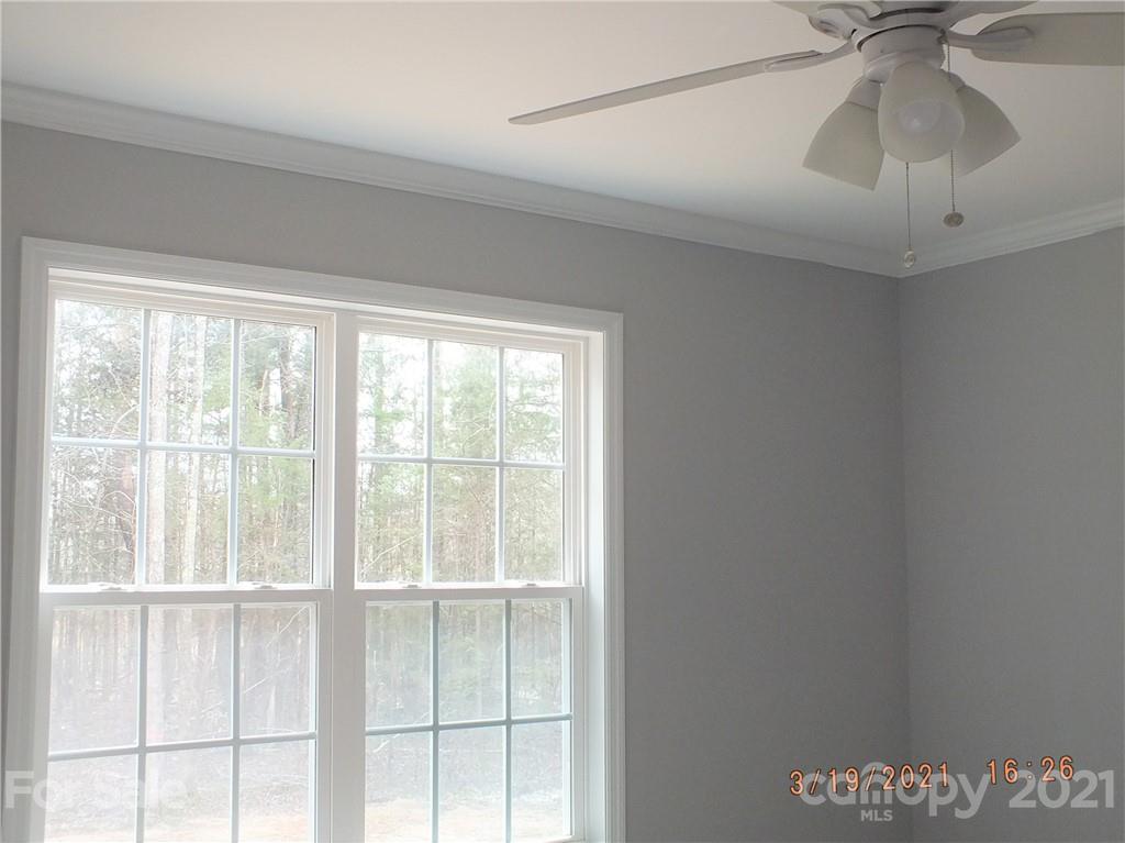 2302 Douglas Road Lancaster, SC 29720 - Photo 12 of 17 a view of an empty room with a window