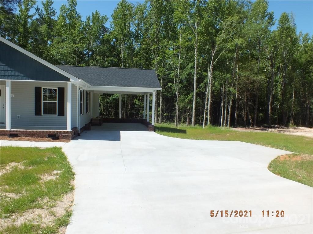 2302 Douglas Road Lancaster, SC 29720 - Photo 15 of 17 a view of a house with backyard and trees