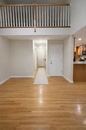 a view of a livingroom with wooden floor