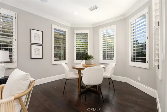 a spacious bathroom with a sink a large mirror and a bathtub