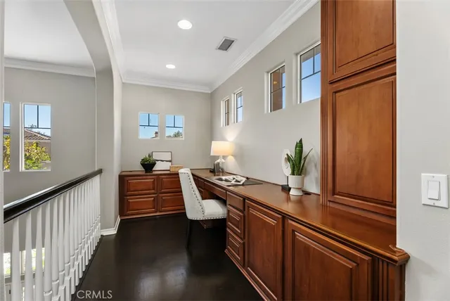 a view of a lake with houses in the back