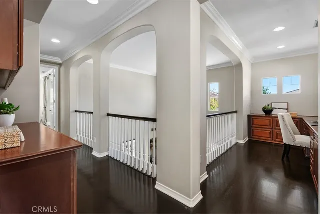 a view of a lake with a house in the background