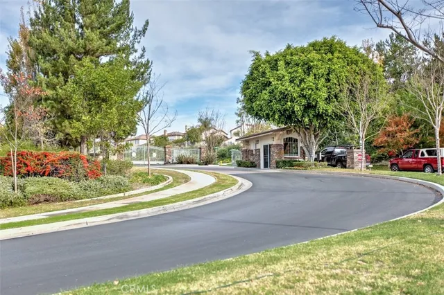 a view of a house with backyard porch and sitting area
