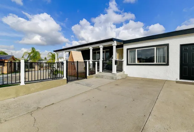 front view of a house with a street