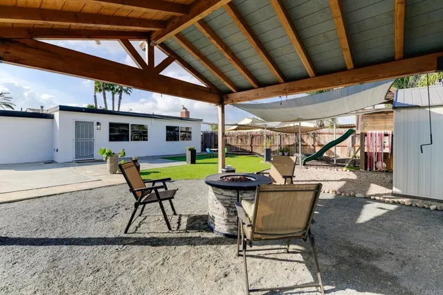 a view of a lounge chairs in the patio