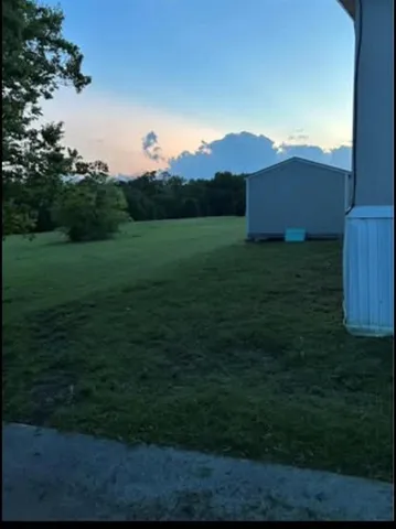 a view of outdoor space and yard