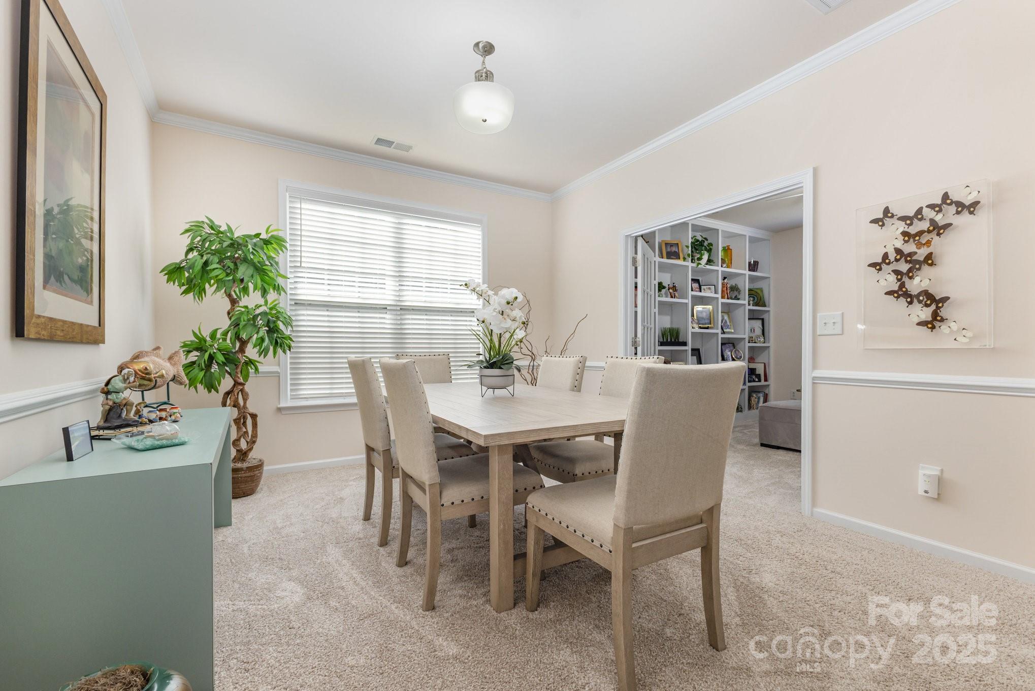 881 Platinum Drive Fort Mill, SC 29708 - Photo 11 of 35 a dining room with furniture and window