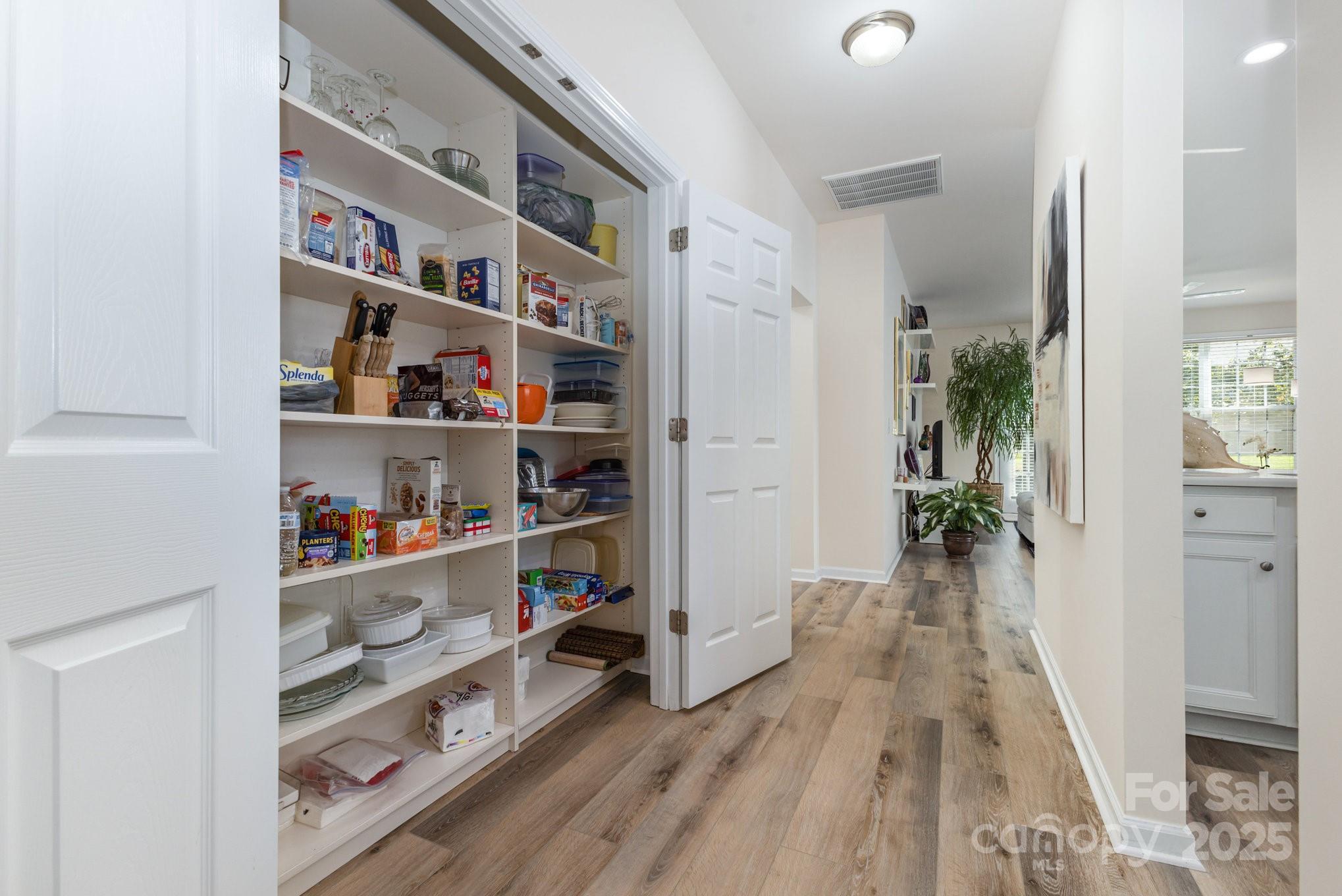 881 Platinum Drive Fort Mill, SC 29708 - Photo 18 of 35 a room with lots of books and plants