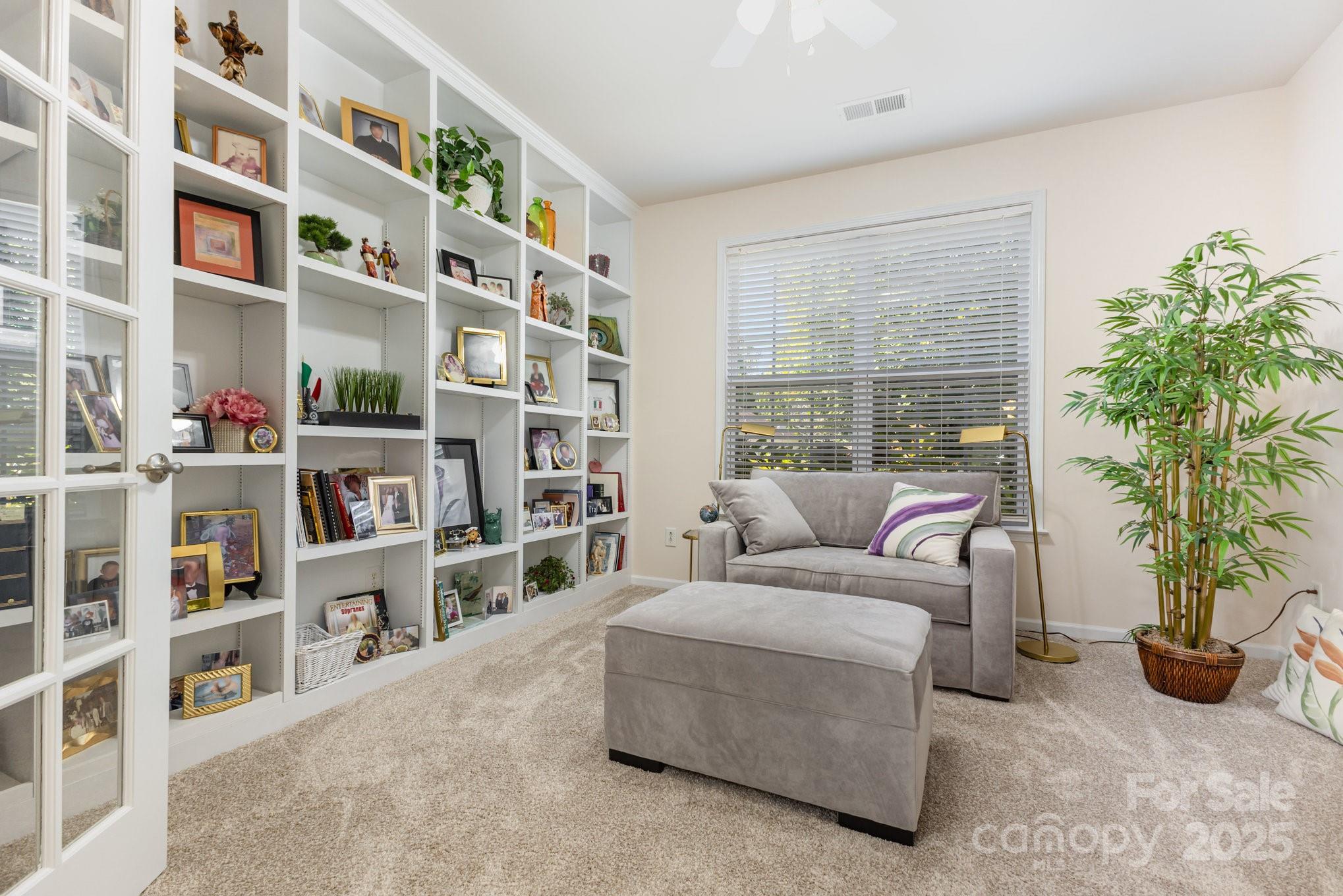 881 Platinum Drive Fort Mill, SC 29708 - Photo 20 of 35 a living room with furniture and a potted plant