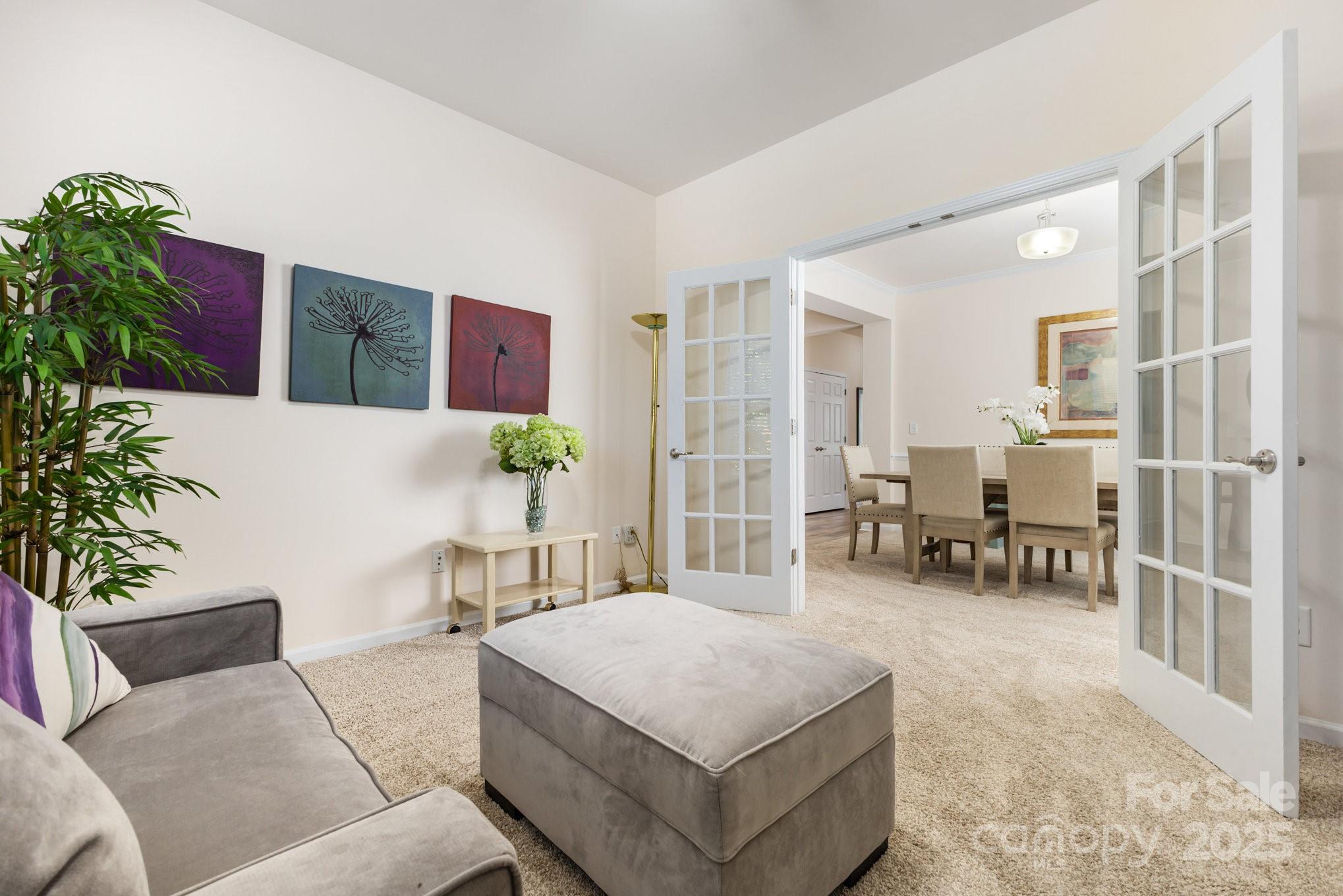 881 Platinum Drive Fort Mill, SC 29708 - Photo 21 of 35 a living room with furniture and flowers